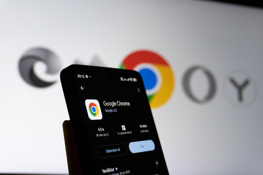 Smartphone displaying google chrome app with logo background